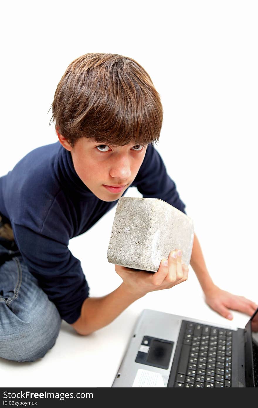 A old computer and teen boy