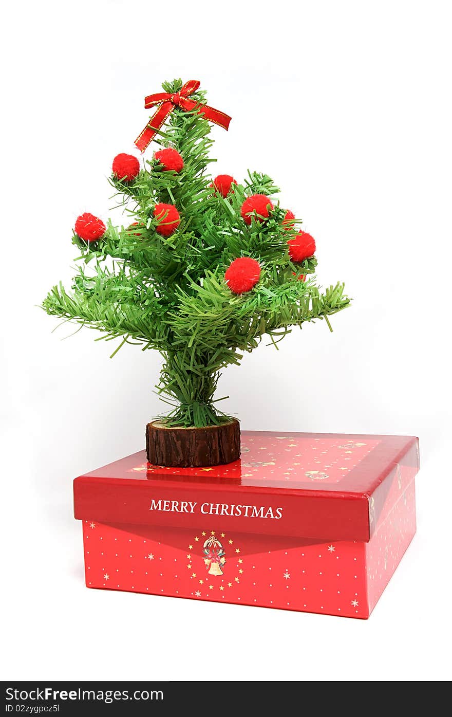 Red gift box and christmas tree on isolated background