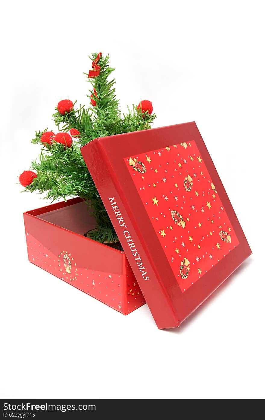 Red gift box and christmas tree on isolated background