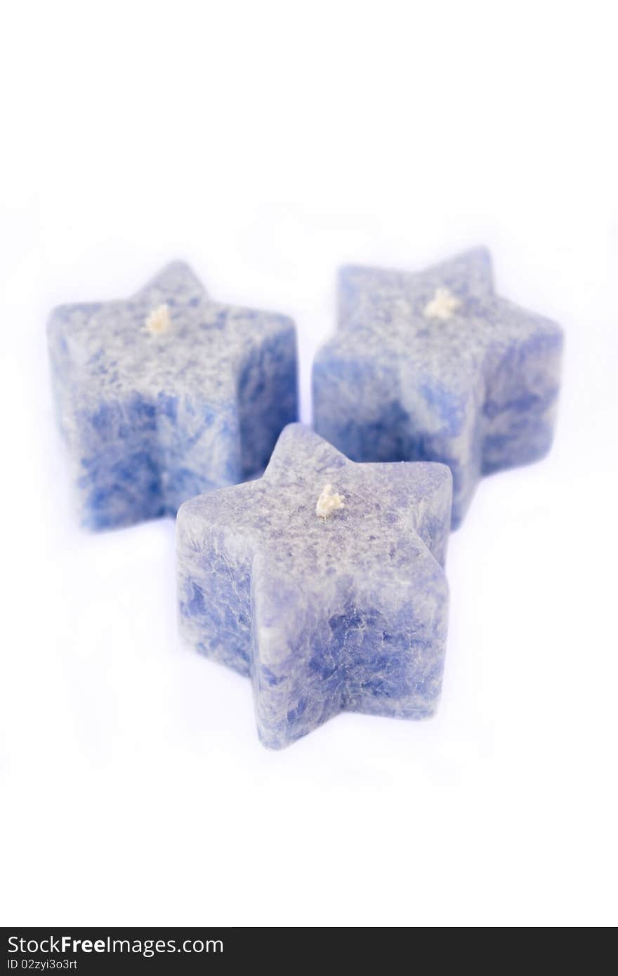 Three blue candles in star form