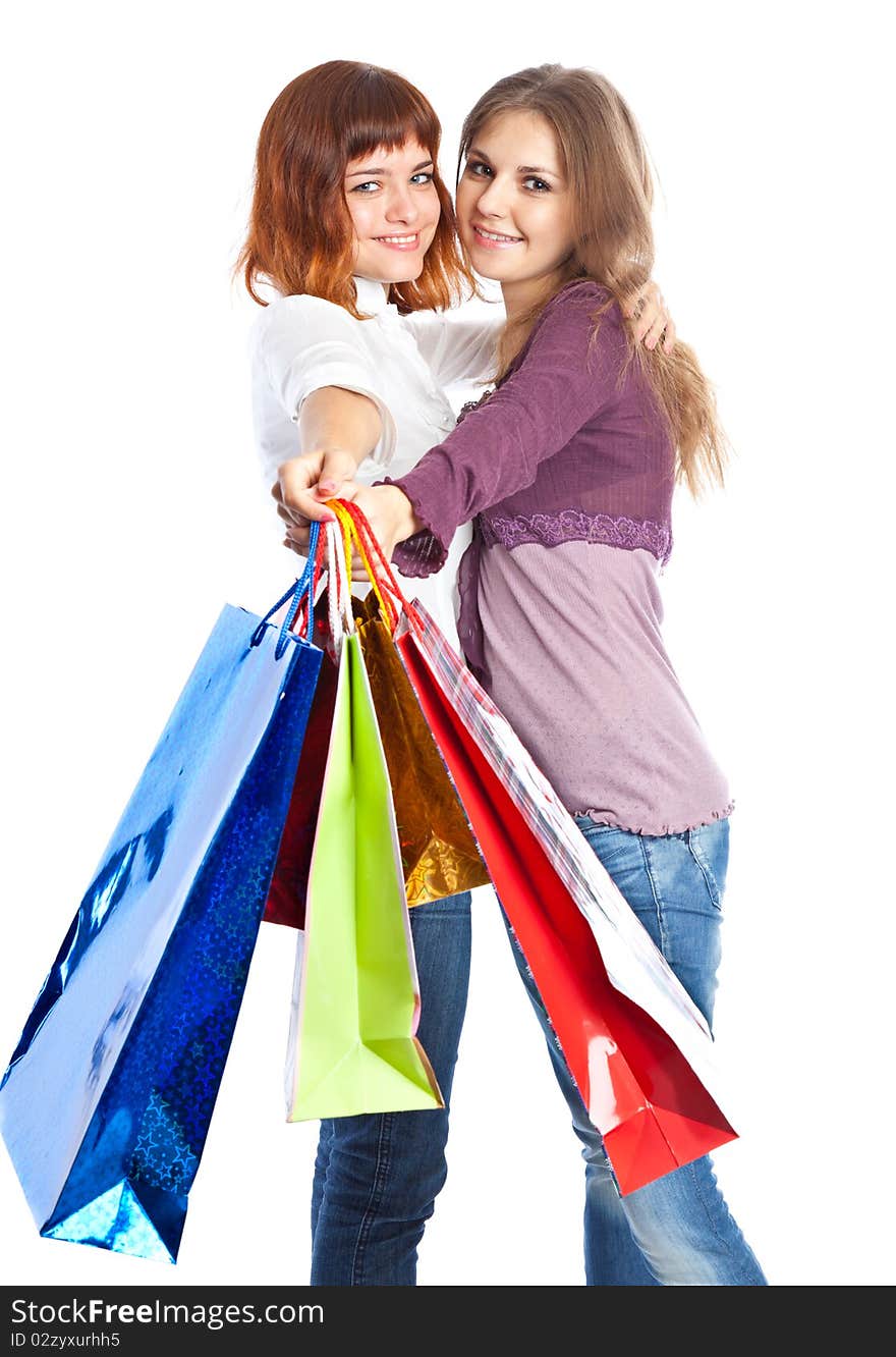 Two teen girls with bags. Isolated on white background