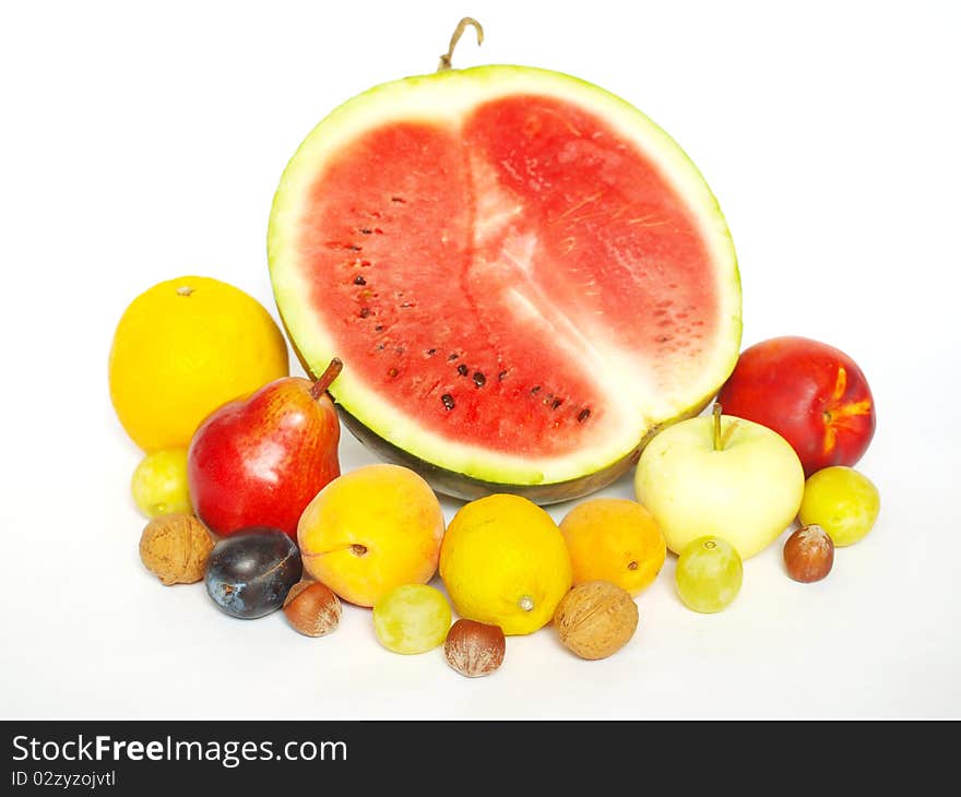 Different kinds of fruit on a white background