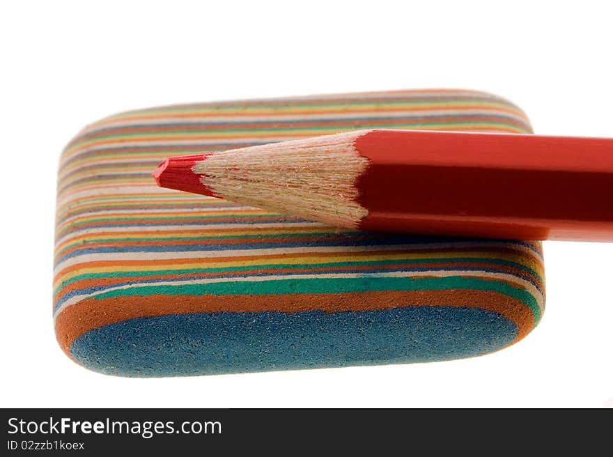 Red pencil which lies on a rubber. Red pencil which lies on a rubber