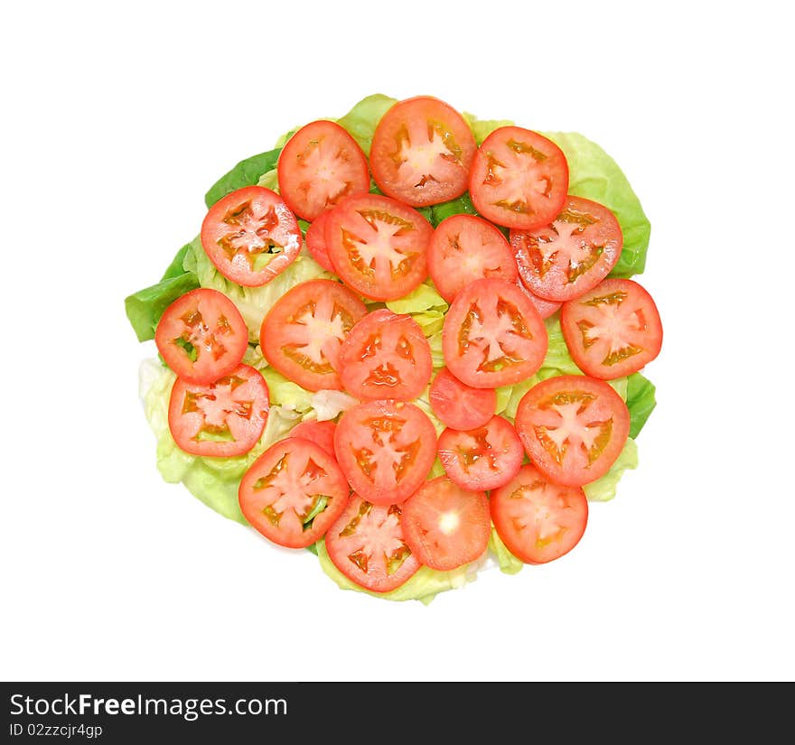 A fresh tomato and vegetables