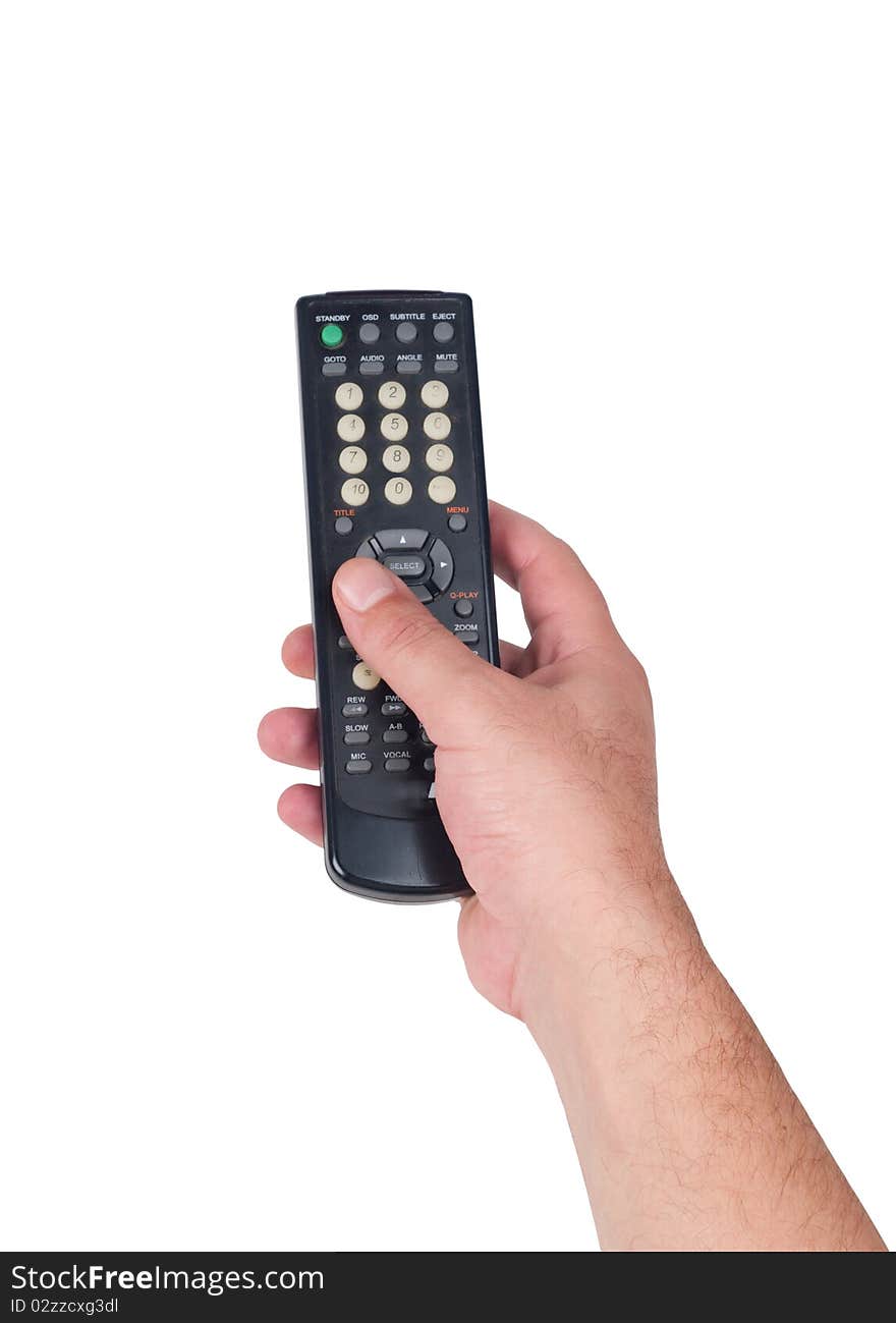 Hand holding television remote Isolated over white background .