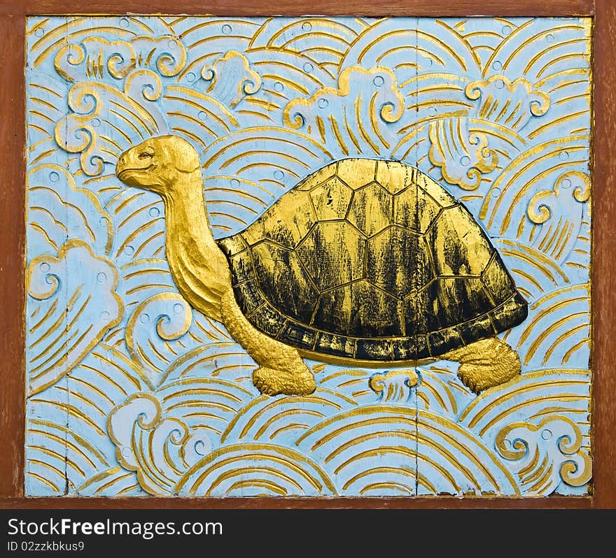 Turtle carve gold paint