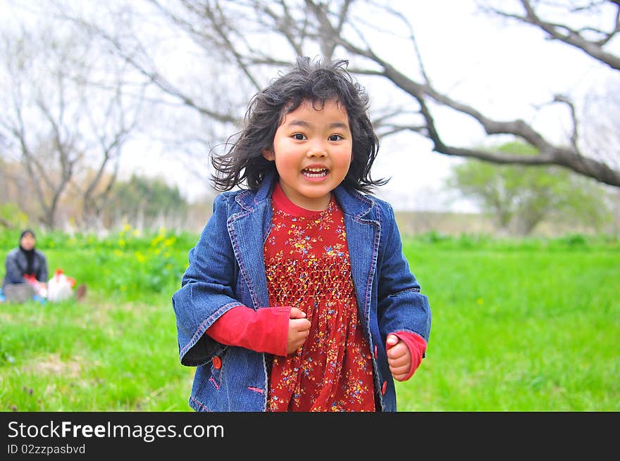 Child running at a garden