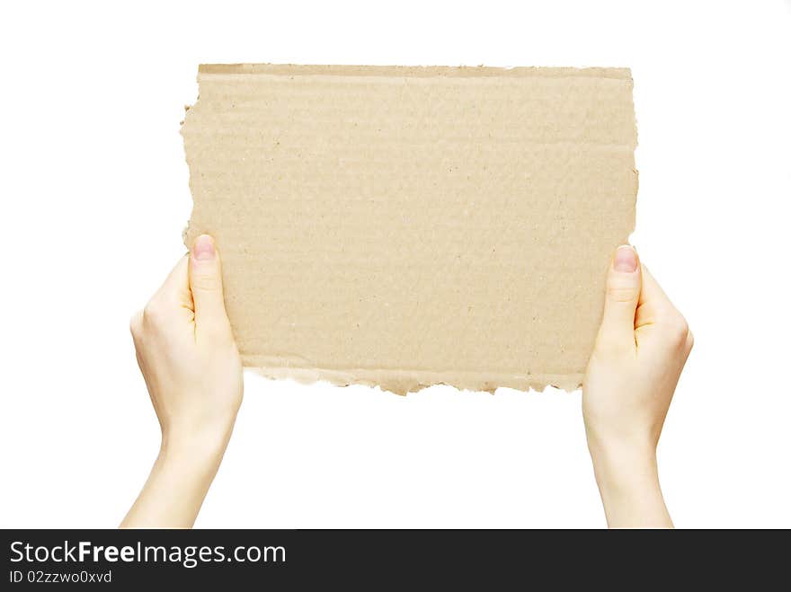 Cardboard blank in a hand isolated on white. Cardboard blank in a hand isolated on white