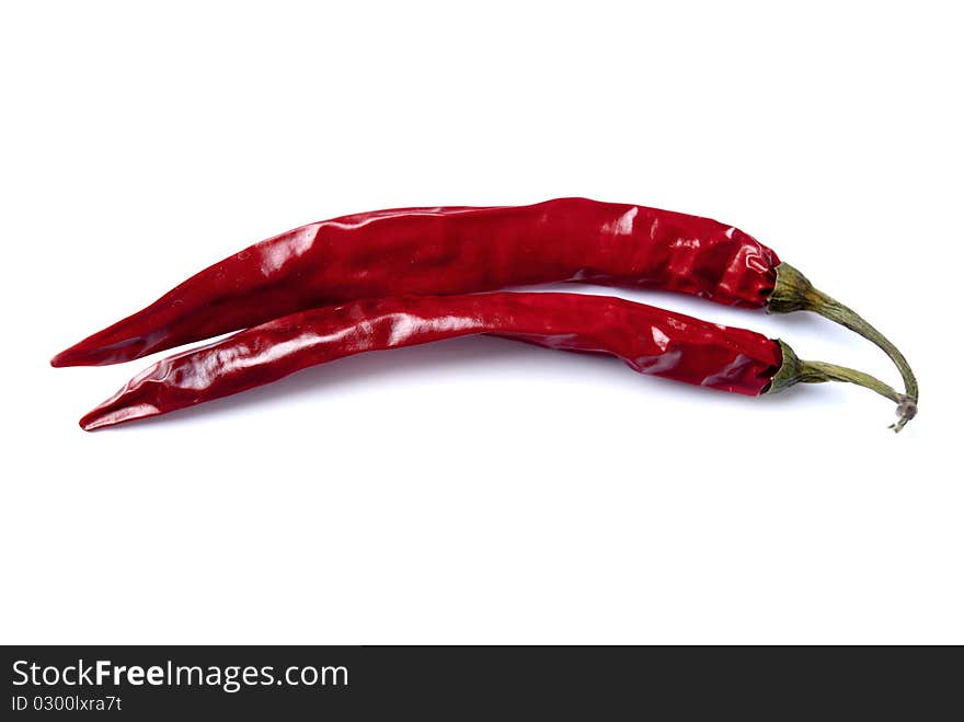 Red chili peppers isolated on white.