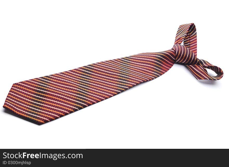 Red striped tie on a white background