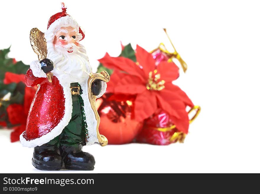 Santa Claus candle with christmas decoration