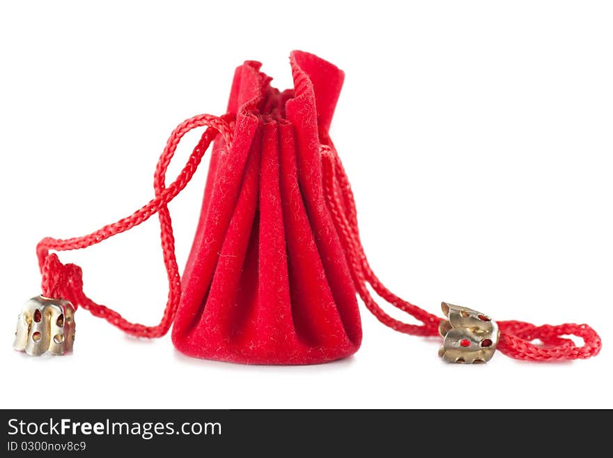 A little red bag for jewelry isolated over white