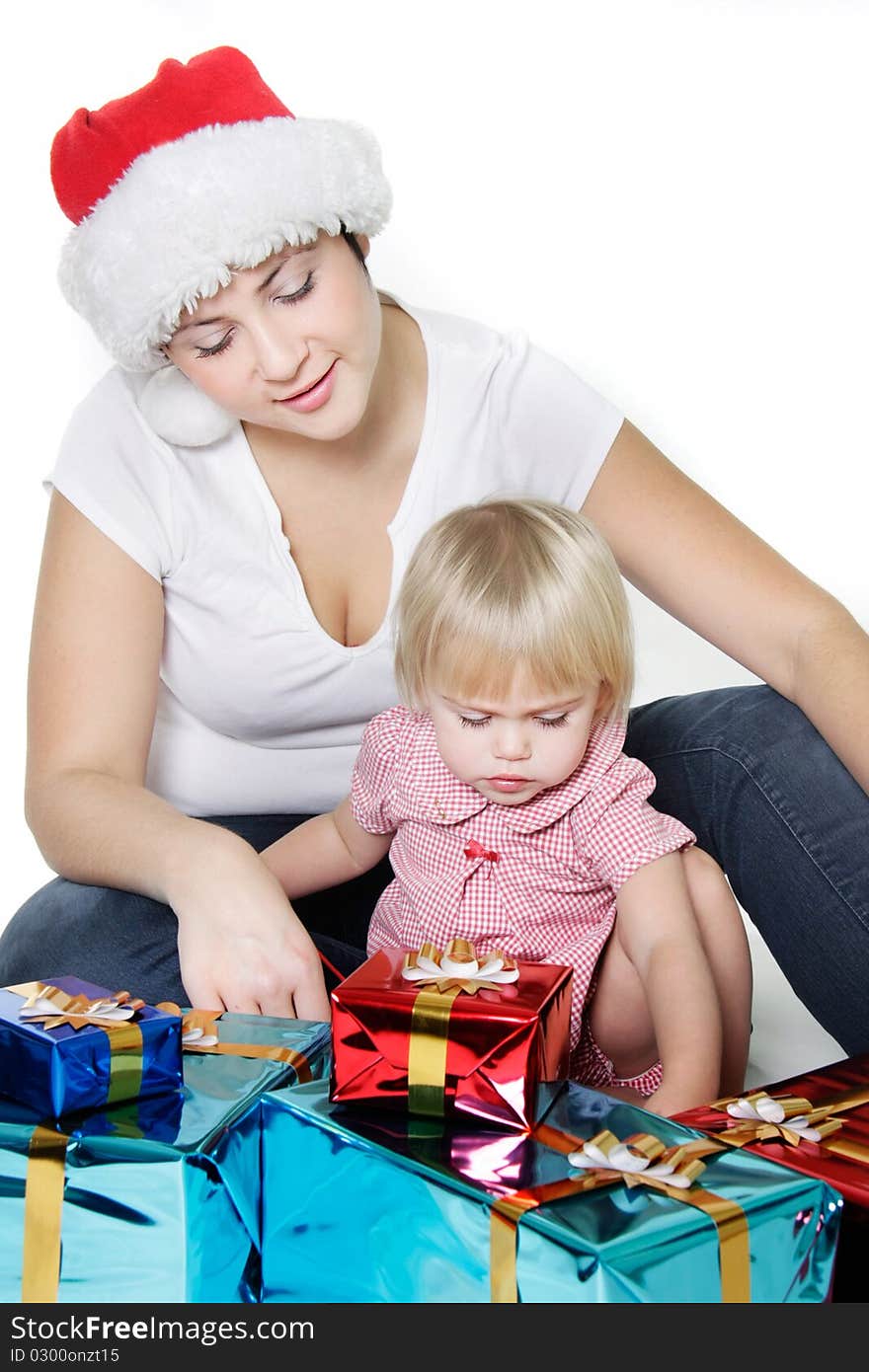 Mother and daughter with christmas gift boxes