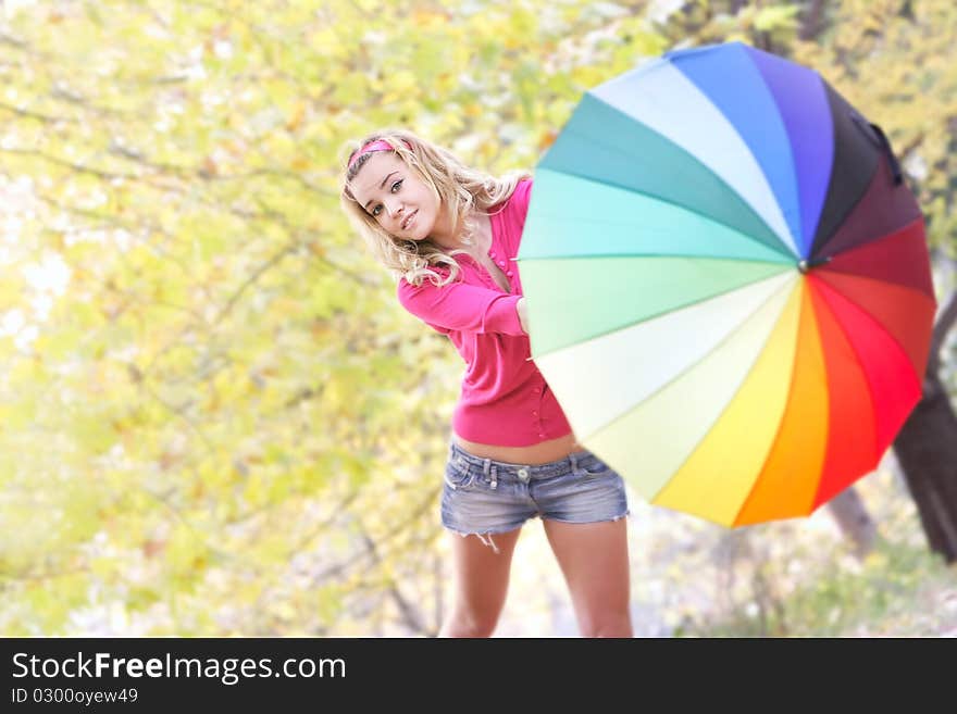 Happy Girl With Colorful Umbrella