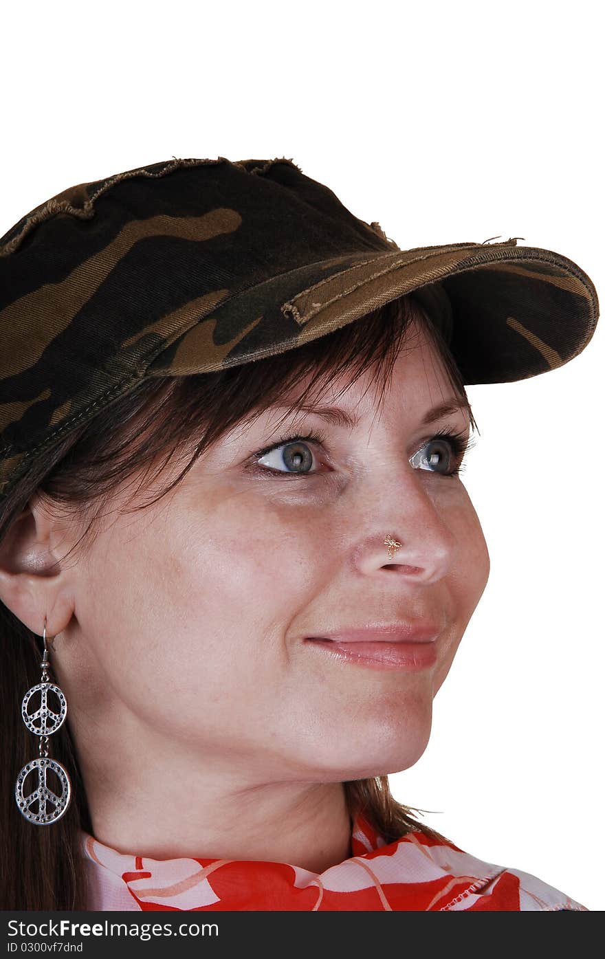 An middle aged woman in an black sweater and a brown hat and scarf standing in the studio, smiling, for a portrait for white background. An middle aged woman in an black sweater and a brown hat and scarf standing in the studio, smiling, for a portrait for white background.