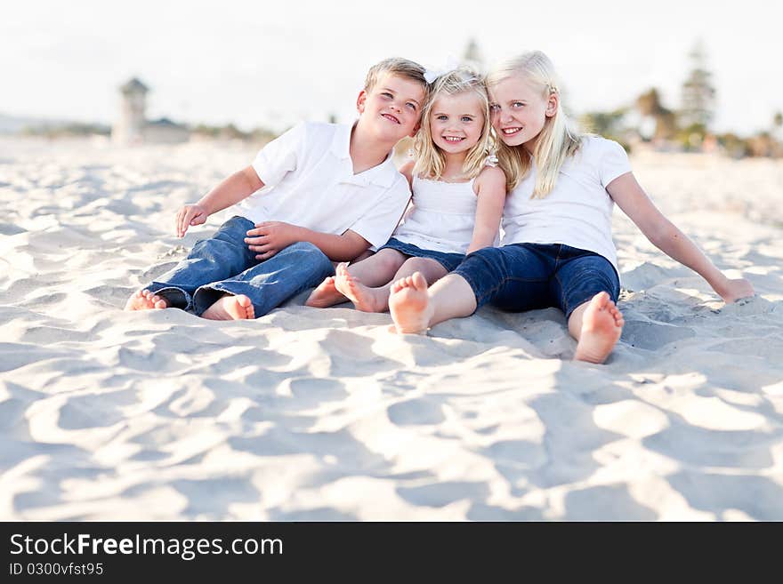 Adorable Sisters and Brother Having A Lot Fun at the Beach. Adorable Sisters and Brother Having A Lot Fun at the Beach.