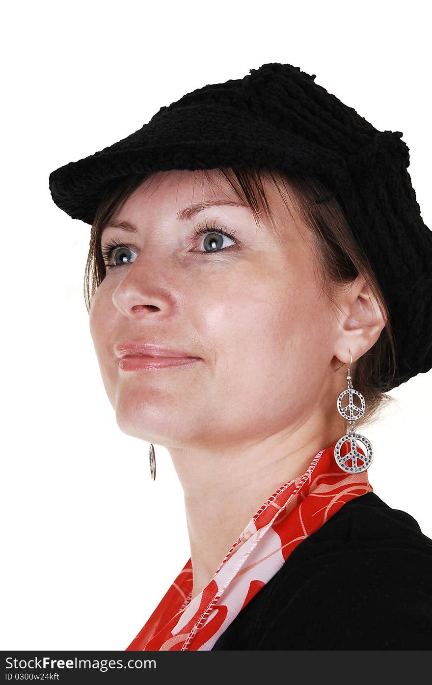 An middle aged woman in an black sweater and a black hat and red 
scarf standing in the studio, smiling, for a portrait for white background. An middle aged woman in an black sweater and a black hat and red 
scarf standing in the studio, smiling, for a portrait for white background.