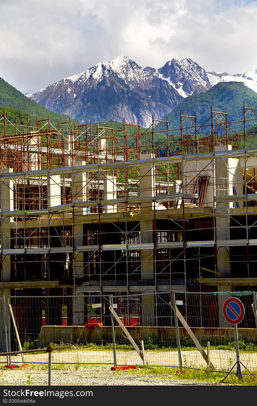 Construction site with mountains in the background