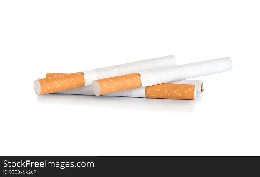 Four cigarettes Isolated on white background (Path). Four cigarettes Isolated on white background (Path)