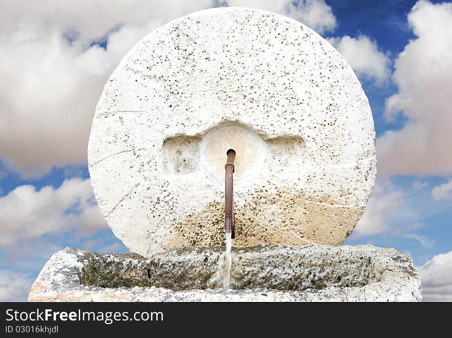 Fountain of life with background of clouds