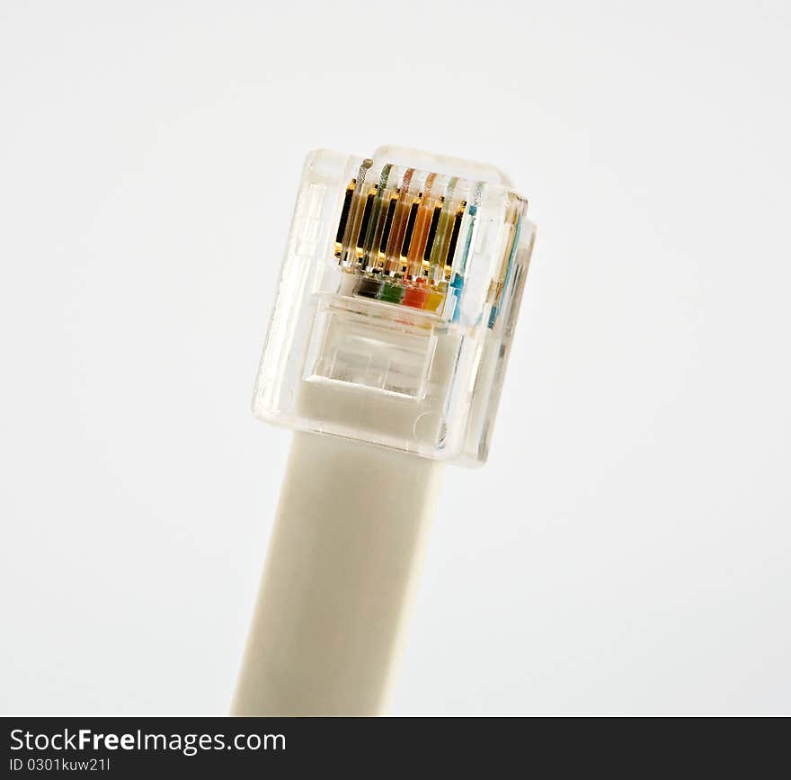 Jack of a phone cord on white background