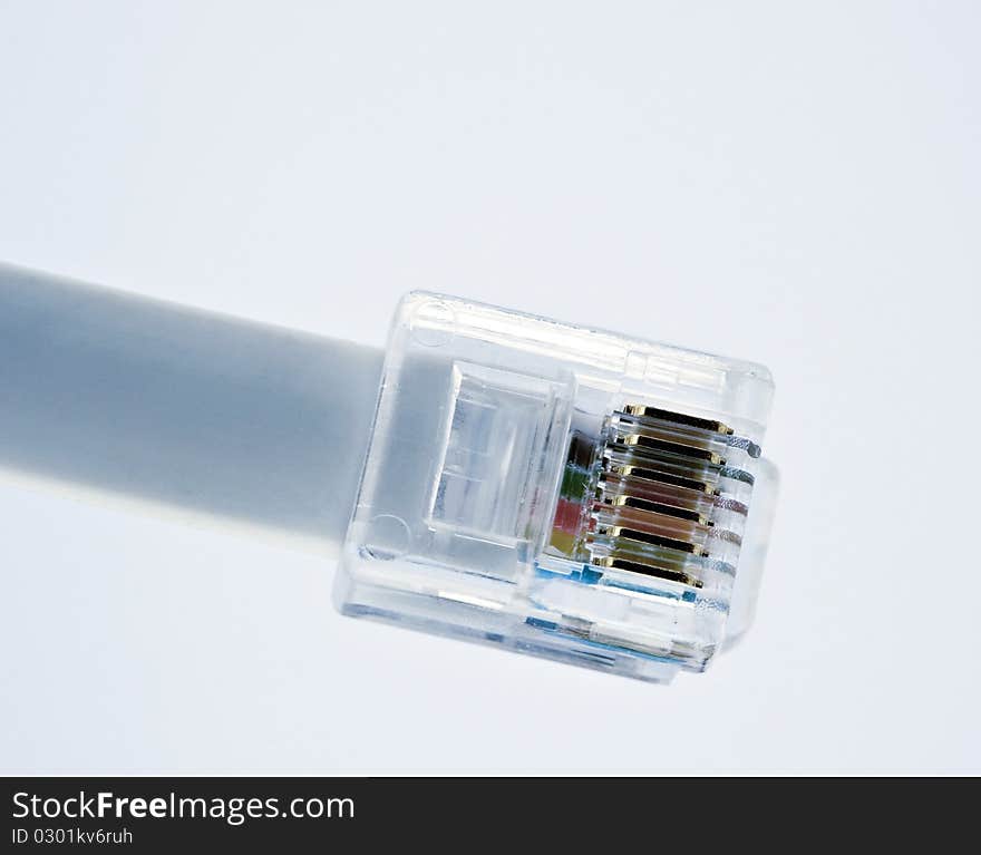 Closeup of a voice cable on white background