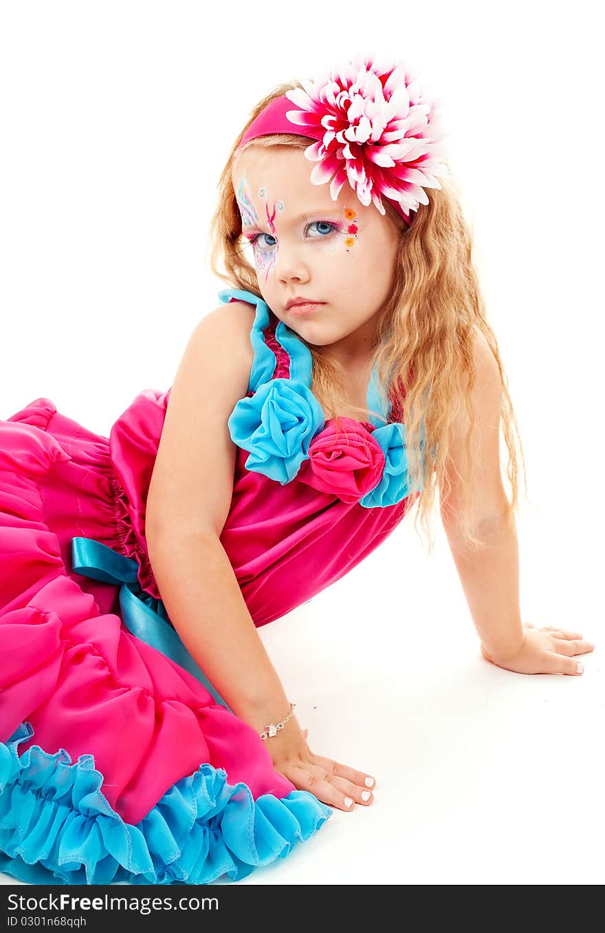 Portrait of the beautiful girl in a red dress