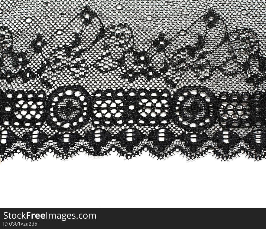 Decorative white lace on insulated black background