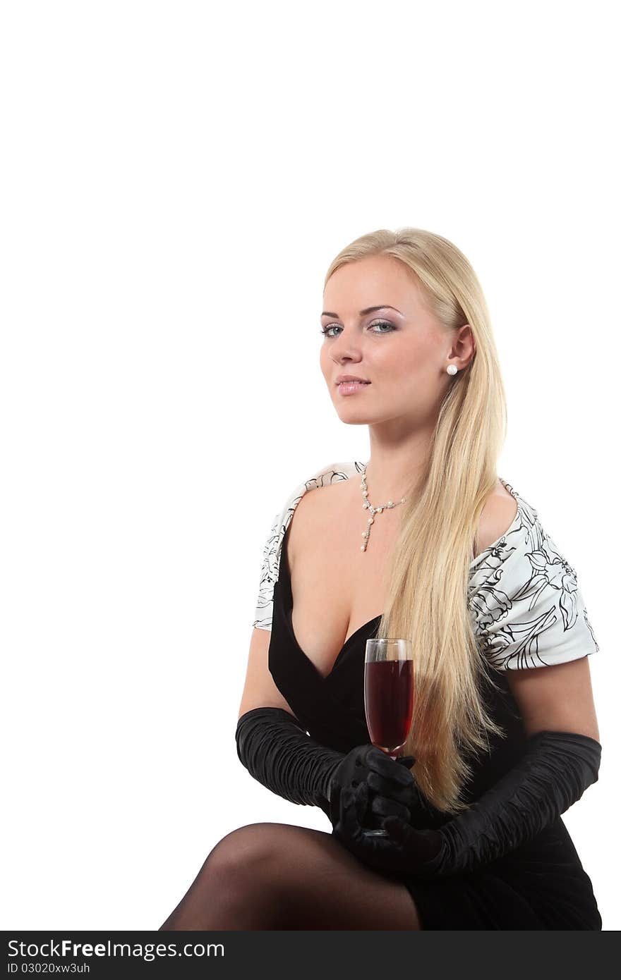 Blond in a dress drink wine