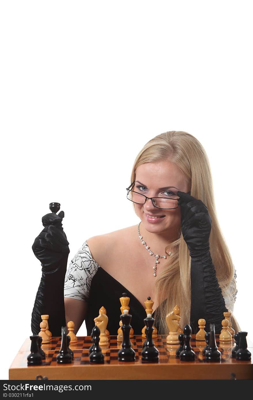 Blond woman play chess