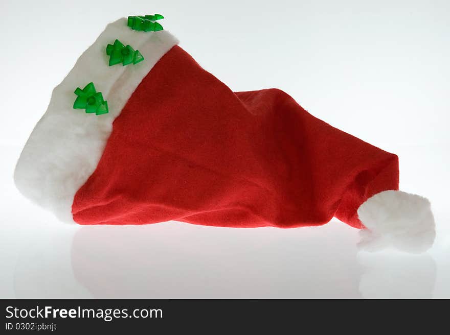 Traditional santa claus hat on white background.