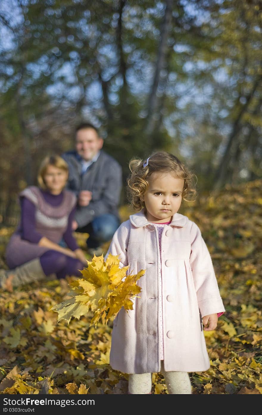 Little girl and parents