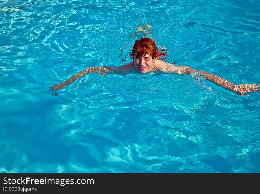 Child has fun in the pool