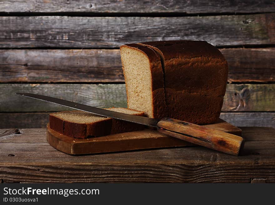 Rye bread on a cutting board. Still Life.