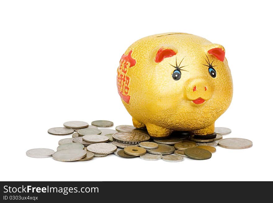 Old coins and a pig a coin box isolated over white