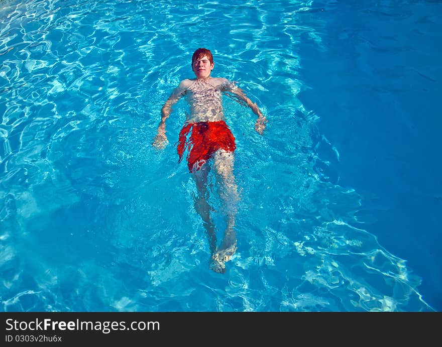 Child has fun in the pool