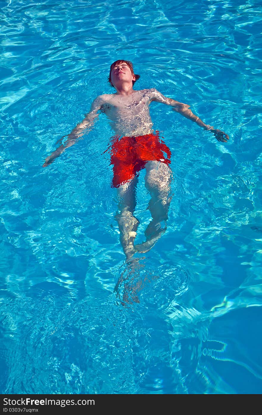 Child has fun in the pool