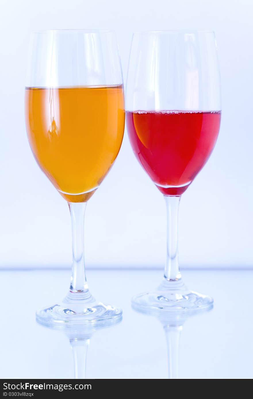 Colored glasses arranged on a glass substrate. Mirror was used as background