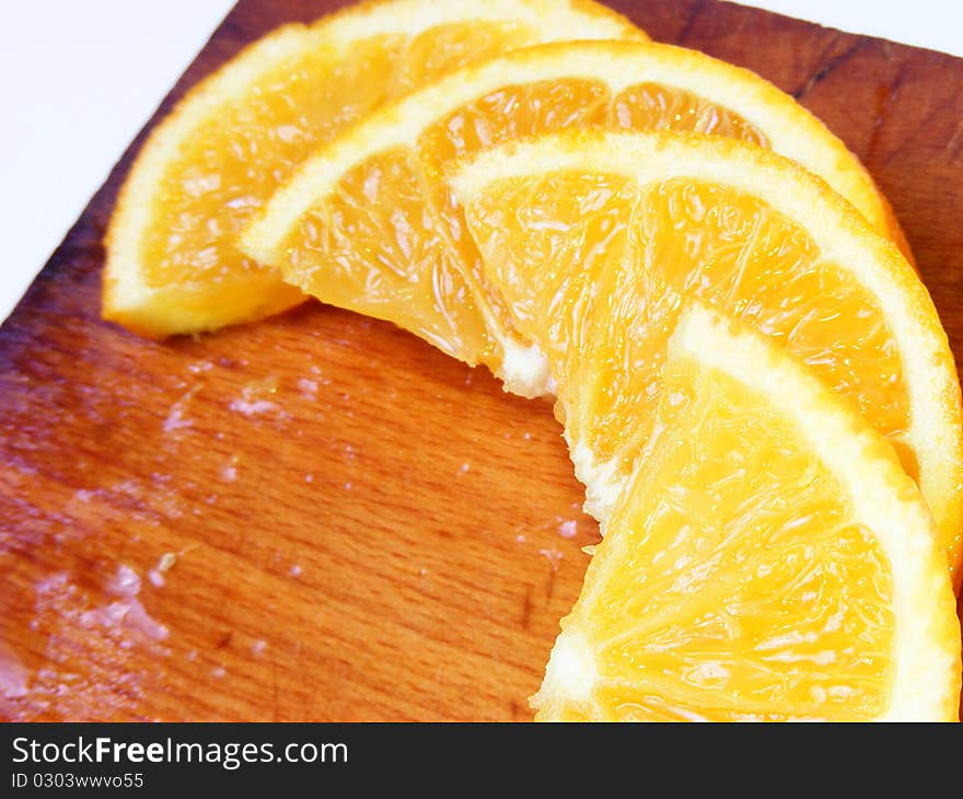 Orange On Wood Board