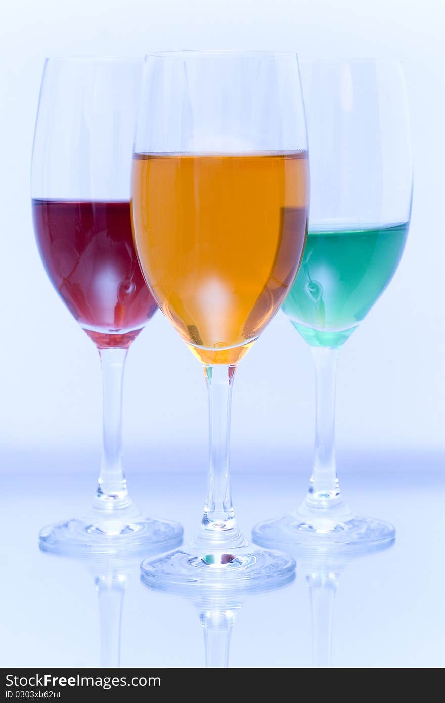 Colored glasses arranged on a glass substrate. Mirror was used as background