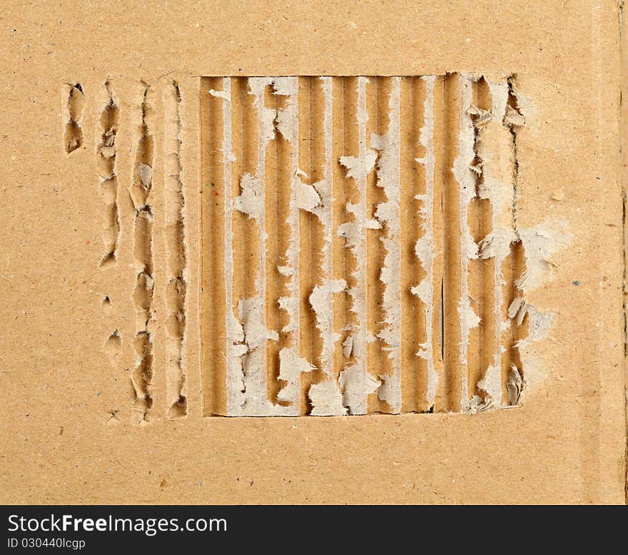 Textured cardboard frame with torn edges. Textured cardboard frame with torn edges