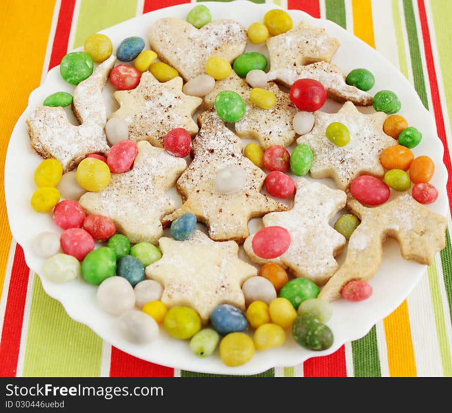 Christmas ginger pastries with the bright candies. Christmas ginger pastries with the bright candies