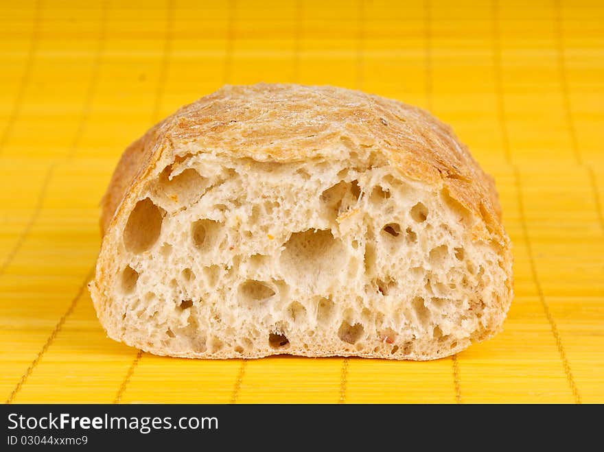 fresh bread isolated on yelloy background