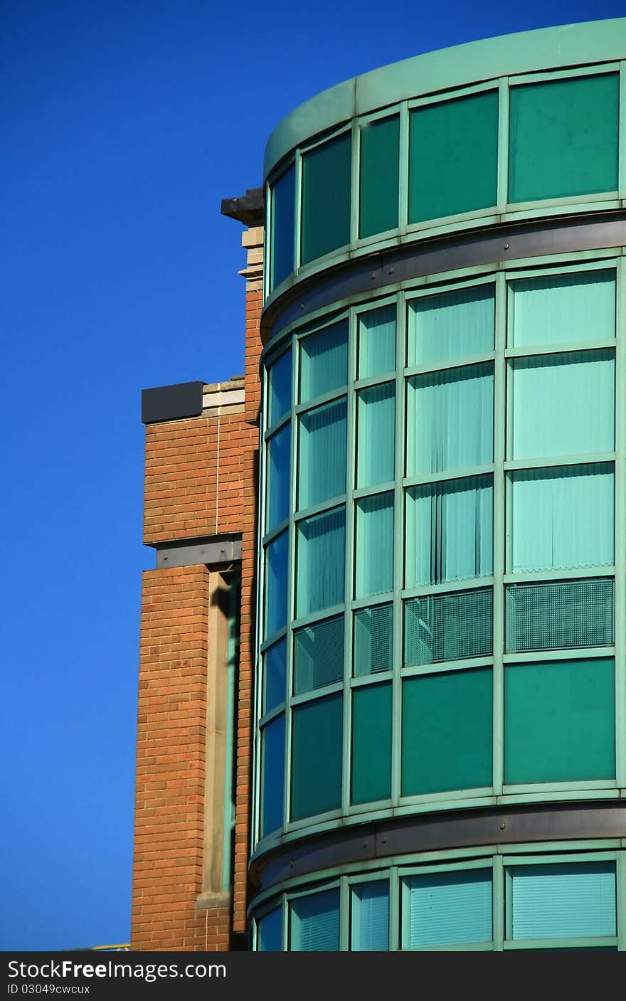 Image of a office building on a sunny day. Image of a office building on a sunny day