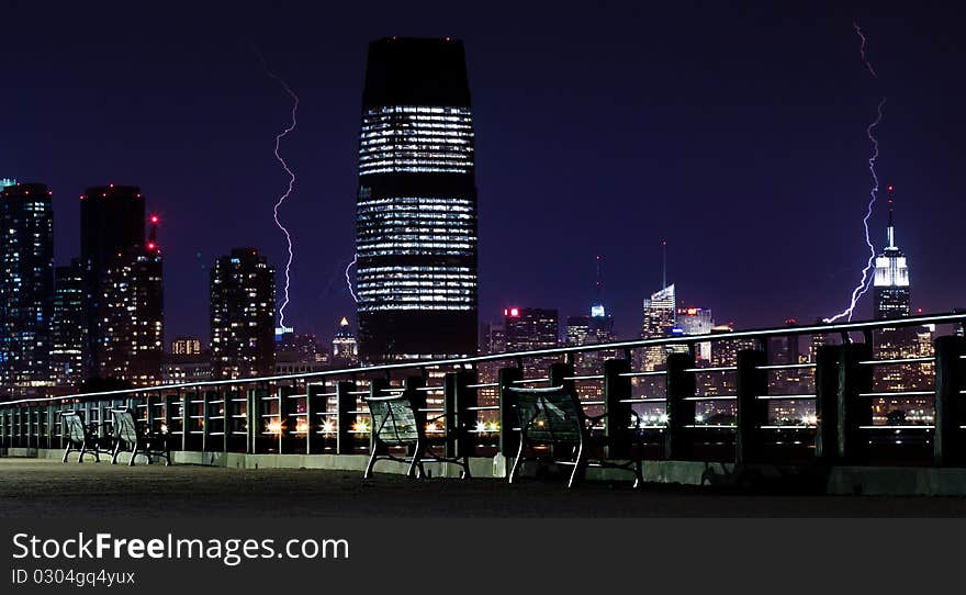 Night lightning under Manhattan's skyscrapers. Night lightning under Manhattan's skyscrapers