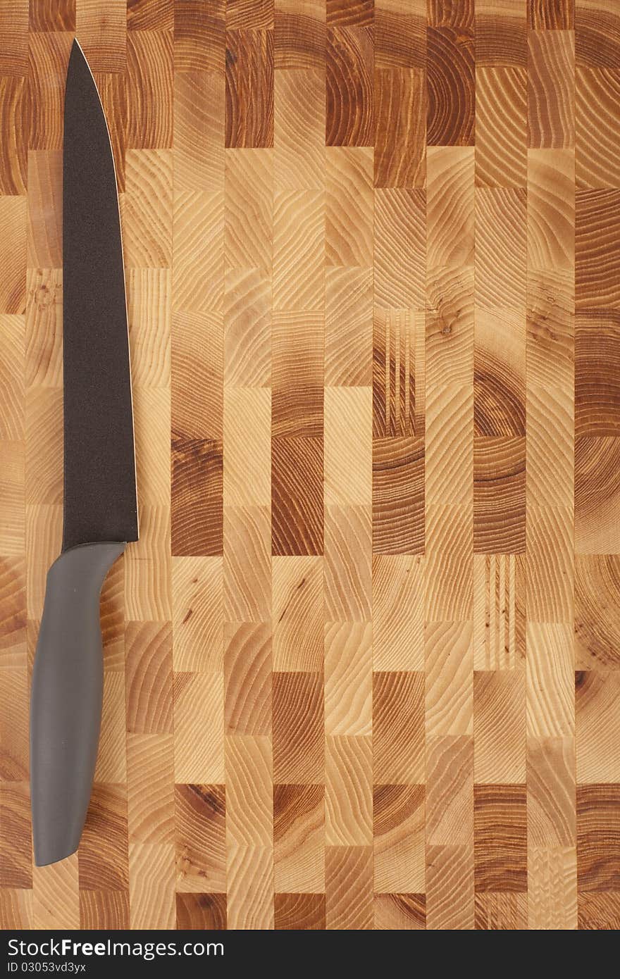 Kitchen knifes isolated on wooden background