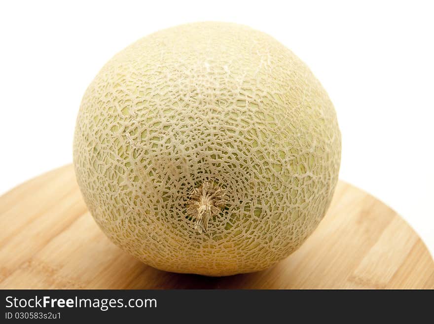 Fresh melon on wood board