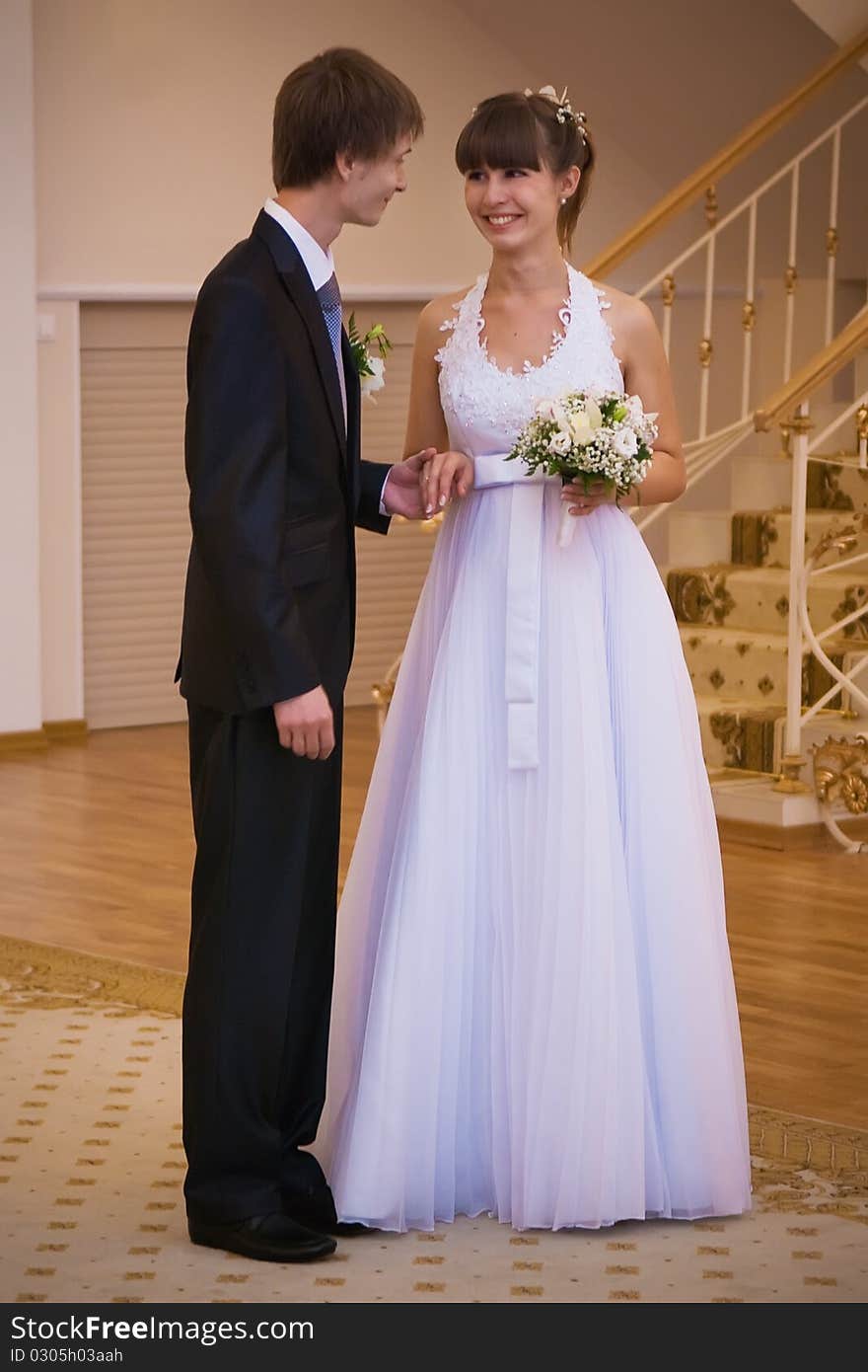 Newly-wed couple in a registry office. Newly-wed couple in a registry office