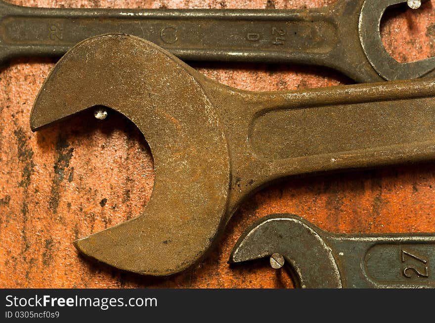 Spanner closeup on wooden board. Spanner closeup on wooden board