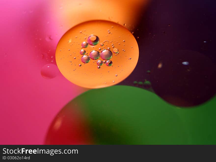 Macro shot of oil and water as background. Macro shot of oil and water as background